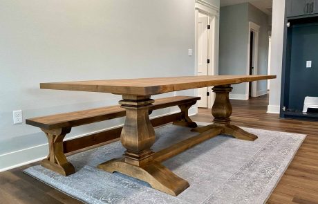 Wooden dining room table and matching bench