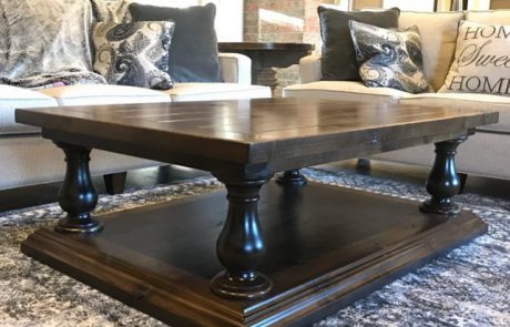 Dark wood coffee table in a rustic living room