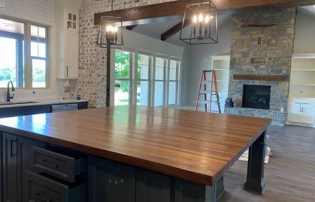 Rustic dark kitchen island with hand made wood counter top